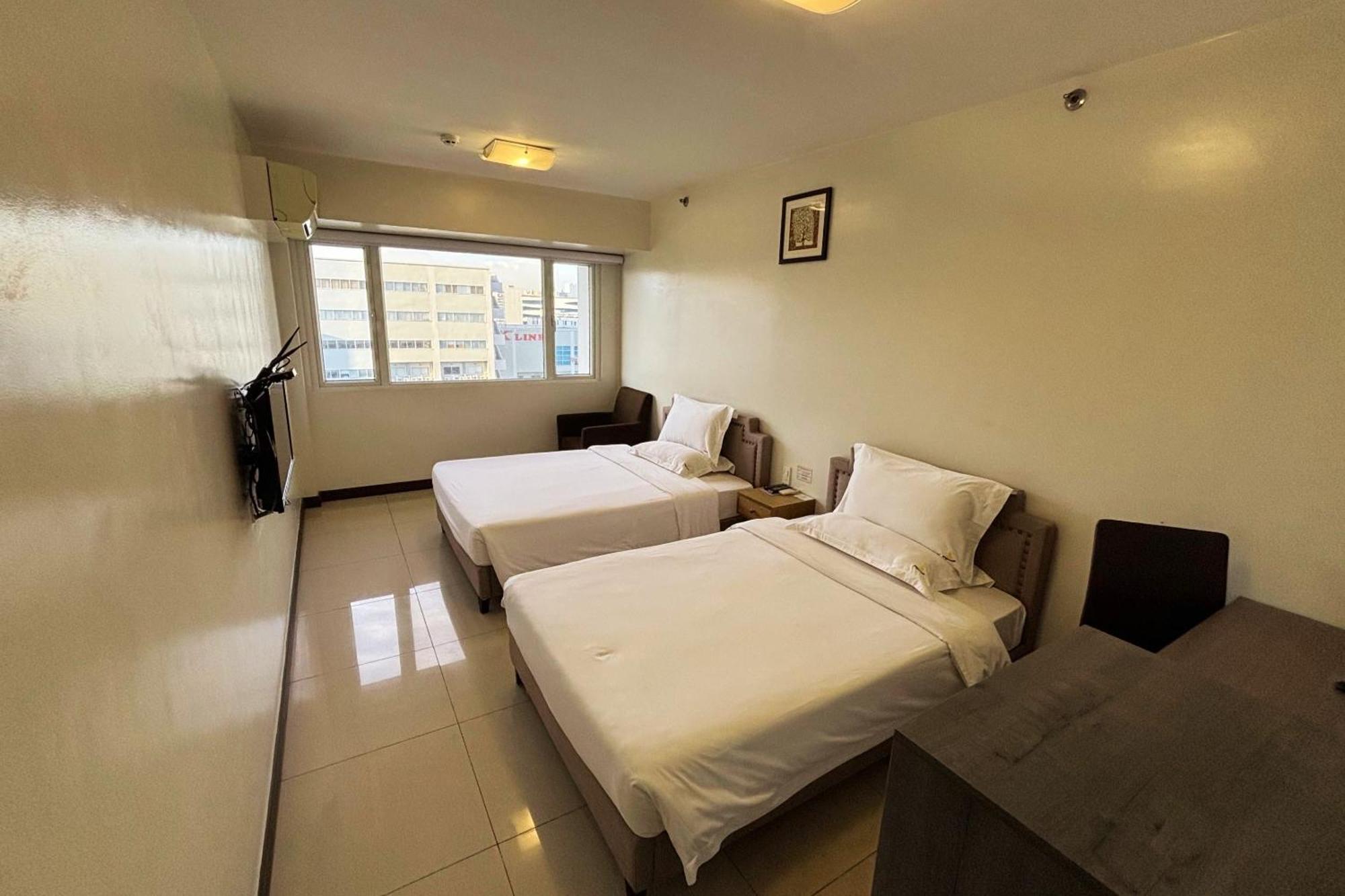 Extremeli Suites Manila Powered By Cocotel Bagian luar foto